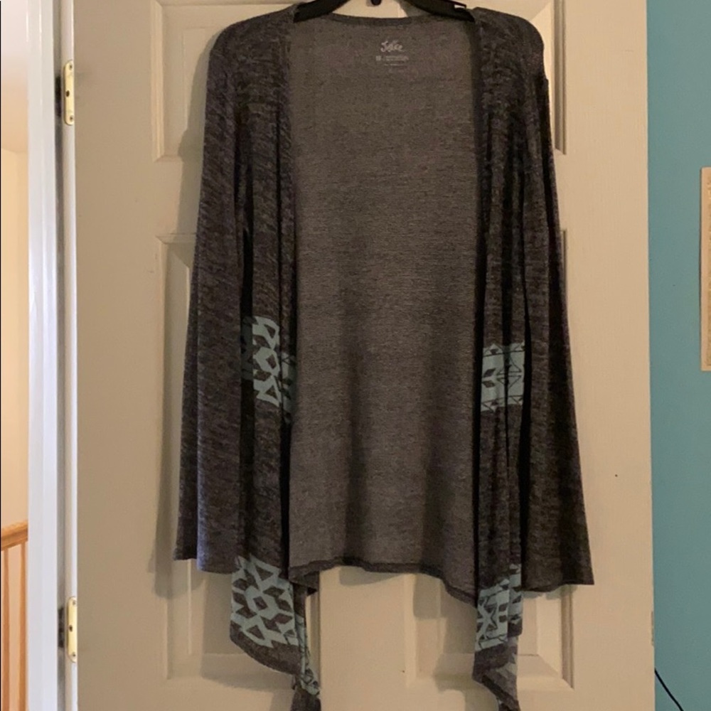 Knitted gray cardigan with blue patterns
